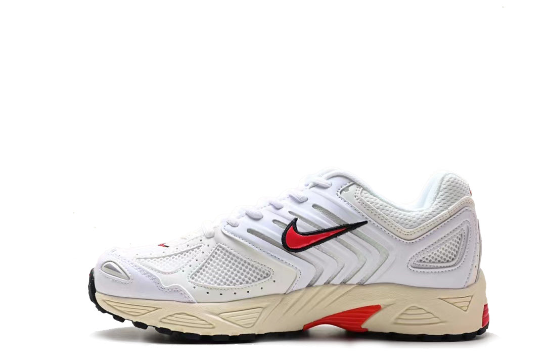 White mesh low-top sneaker with red-and-black side logo detailing, cream midsole, and black outsole