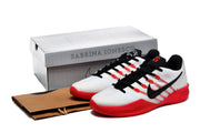 Pair of shoes beside a box labeled Sabrina Ionescu.