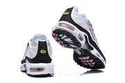 Rear and outsole views of Nike Air Max Plus sneakers showing the heel cushioning and pink outsole details