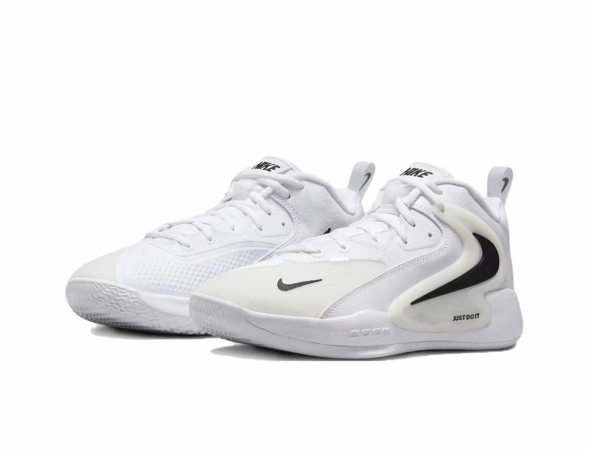 Pair of white and black Nike 911-4 sneakers shown from a three-quarter angle, with lace-up fronts, black Swoosh details, and textured outsoles.