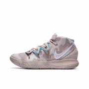 Side view of a Nike Kyrie S2 basketball sneaker in a light camouflage-style colorway with turquoise lace accents.