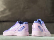Rear view highlighting the pink heel structure, checkerboard panels, heel signatures, and Zoom midsole lettering.