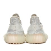 Rear view of the cream and gray sneakers, duplicated from image 1.