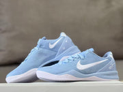Low side view of the light blue and white shoes