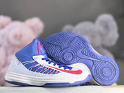 Side and outsole views of the blue, white, and red high-top shoe