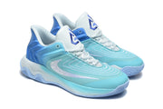 Pair of aqua-blue Nike shoes shown from a three-quarter angle