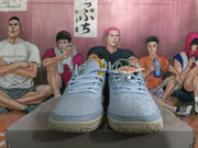 Front view of light blue Nike basketball shoes with lace-up fastening and patterned uppers