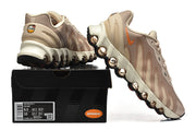 Nike Air Max DN8 sneakers displayed with a shoebox whose size label shows a sample size
