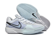 Side and outsole view of the Nike GT Cut sneakers, showing the black Swoosh, light blue panels, and patterned tread.