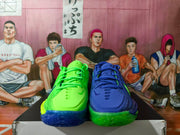 Pair of blue and volt-green Nike GT basketball shoes shown from the front.