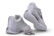 White and silver Nike Sabrina 4 shoes shown from the heel and outsole