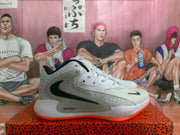 Side view of a white Nike basketball sneaker showing black branding, a gray midsole detail, speckled heel panels, and an orange outsole.