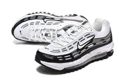 Pair of black and white Nike Air Max 97 sneakers in a side and angled view.