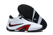 Basketball shoe pair with one shoe turned to show its patterned black outsole