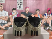Rear view showing black collars, patterned heel panels, and vertical black heel accents.