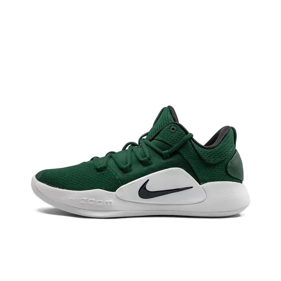 Green Nike low-top sneaker with a black Swoosh and white midsole