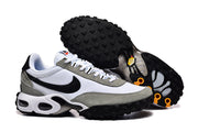Nike Air Max TW sneakers showing the side profile and lugged black outsole.