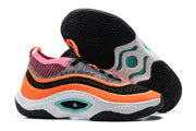 Orange, pink, black, and white Nike Anthony Edwards 3 shoes, with outsole view