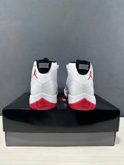 Rear view showing the red heel branding and black heel tabs.