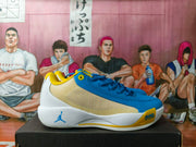 Side view of a blue Jordan basketball shoe with yellow accents and white midsole