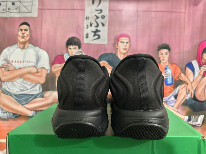 Rear view of black Nike basketball shoes showing heel and outsole details