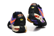 Rear view of the Nike Air Max Plus Utility sneakers with black heel panels and visible outsole tread.