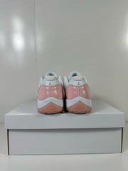 Rear view of the pair with pink heel overlays and Jordan branding on the white heel panels.