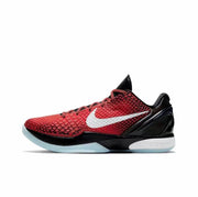 Red and black Kobe 6 sneaker with a white Swoosh and translucent light-blue outsole.