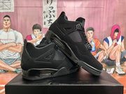 Angled product view showing a pair of black high-top sneakers with side mesh panels and visible air-style sole windows.