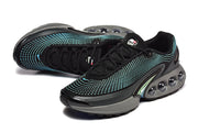 Top and side view of black lace-up sneakers with turquoise patterning