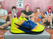 Side view showing the black Swoosh and blue and orange-toned shoe panels