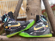 Pair of Nike Kobe 9 All-Star shoes in profile with black, gray, and multicolor patterning