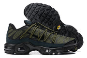 Side and outsole views of olive and black Nike TN sneakers