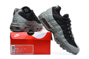 Nike Air Max 95 TT sneakers displayed on a box; the label shows style code HM4740-015 and a photographed US 8.5 size.