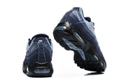 Nike Air Max 95 sneakers shown from the heel and sole, with visible Air units.