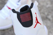 Rear close-up showing the black heel tab, red number detail, and red Jordan logo.