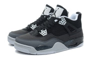 Three-quarter view of the displayed pair with black uppers, grey panels and white tongue accents.