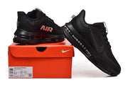 Black Nike Pegasus Premium shoes displayed on an orange Nike box; the box label shows a sample size.