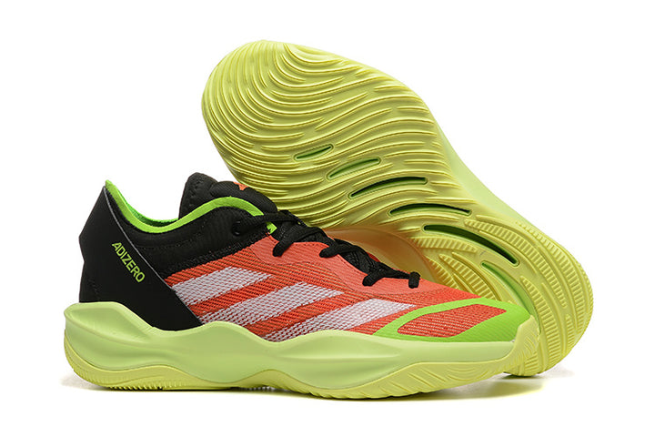 Adizero sneaker in coral orange, black, white and lime green with a pale green patterned sole