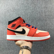 Side profile of an orange-pink and cream high-top Jordan sneaker with a black Swoosh and blue laces.