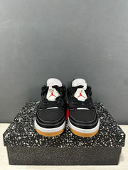 Front view showing black laces, white tongues with red Jordan branding, and layered white stitching.