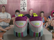 Rear view of the shoes with purple collars and contrasting heel details