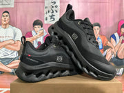 Pair of black On Cloudtilt sneakers shown from the side