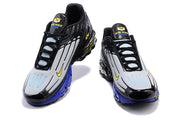 Front views of the black, grey, and blue Nike Air Max Plus 3 sneakers.