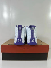 Rear view of the white and purple Air Jordan 12 Retro heels