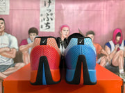 Rear view showing blue and orange gradient heel panels and black heel details.