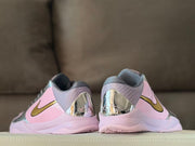Rear view showing the reflective silver heel sections and textured gray collars.
