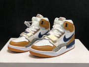 Pair of Jordan Legacy 312 sneakers shown from a front three-quarter angle with Just Don tongue branding visible.