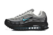 Side profile of a grey and black sneaker with turquoise accent and visible cushioning unit