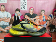 Side profile of one basketball sneaker with a patterned upper, black detailing, orange accents, and a textured outsole.